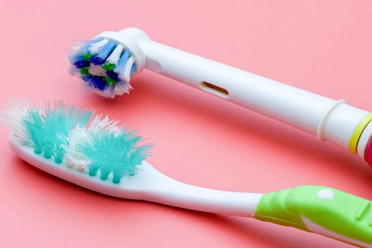 A picture of a worn out toothbrush